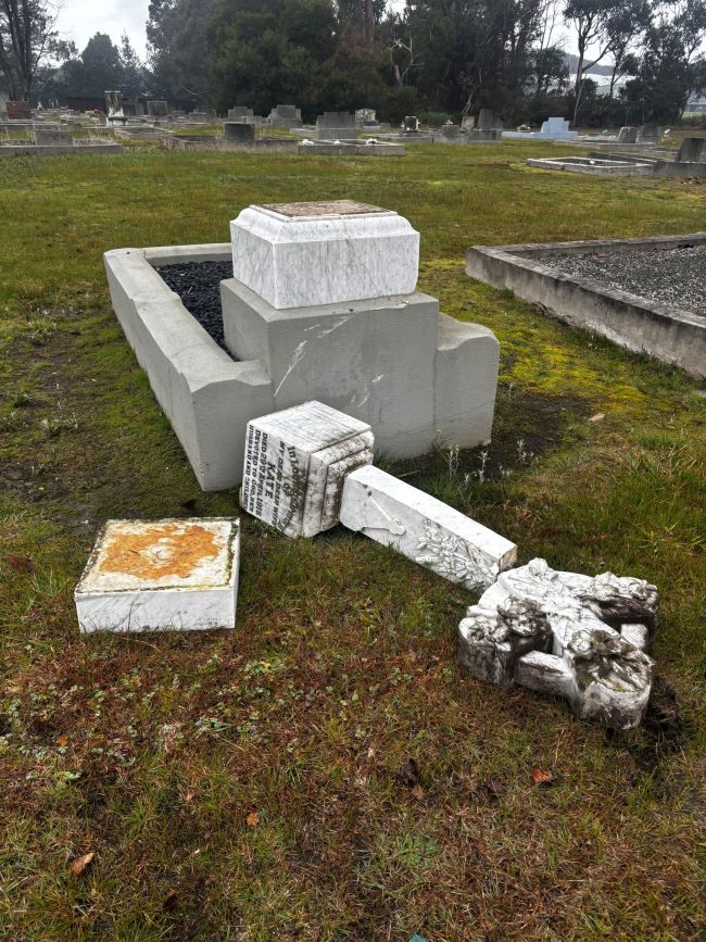 Image shows a vandalised gravestone